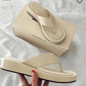 Beige platform flip flops